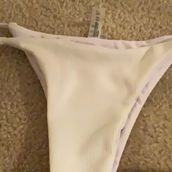 Very cute bikini, size small… white with light purple strings, the top is padded - Picture 2 of 6